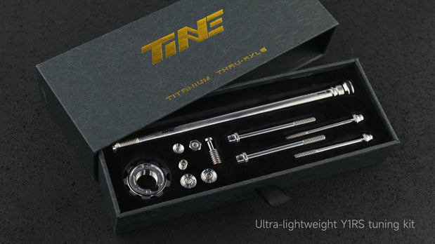 TiNE ti-nium thru-axle tuning kit components