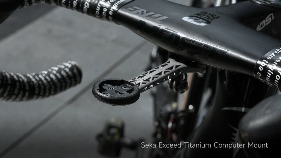Seka Exceed titanium computer mount on black bike handlebar