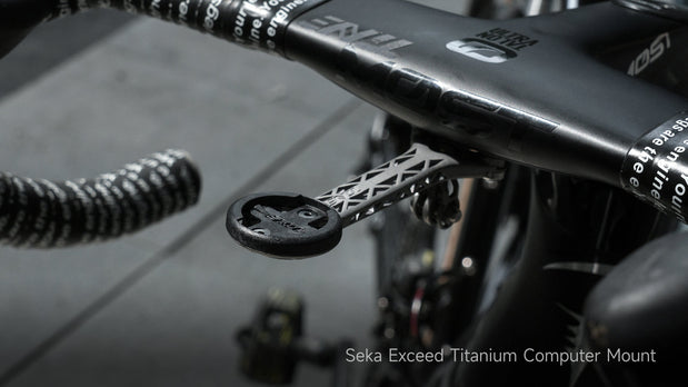 Seka Exceed titanium computer mount on black bike handlebar