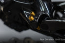 Gold titanium Shimano rear derailleur limit screws installed on black 105 R7170 derailleur, showing L H markings, 1.0 g each vs 3.0 g stock.