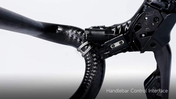 TiNE titanium STI lever clamp rings on carbon handlebar