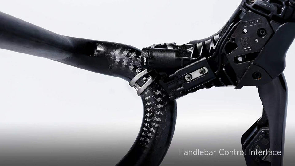 TiNE titanium STI lever clamp rings on carbon handlebar