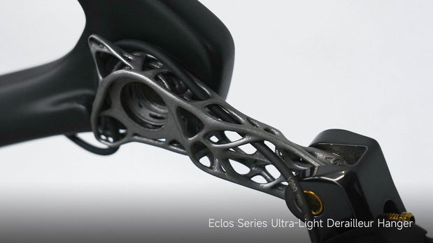 TiNE TECH's Eclos ultra-light titanium derailleur hanger mounted on bike component