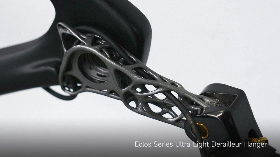 TiNE TECH's Eclos ultra-light titanium derailleur hanger mounted on bike component