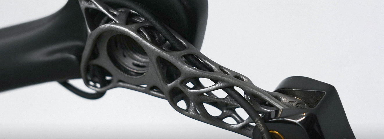 TiNE TECH's Eclos ultra-light titanium derailleur hanger mounted on bike component