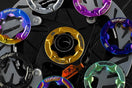 Colorful TiNE centerlock adapters on disc brake rotor for adapter guide