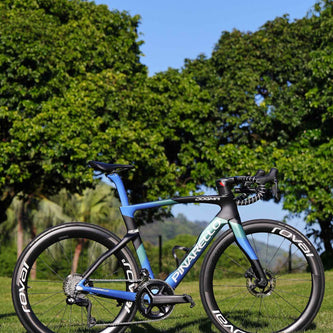 TiNE TECH presents Pinarello Dogma road bike with blue-black gradient frame, Roval wheels, aerospace titanium