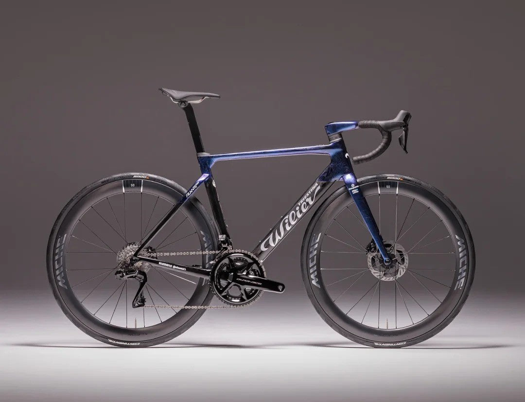 Blue and black Wilier road bike with aerodynamic design and titanium components