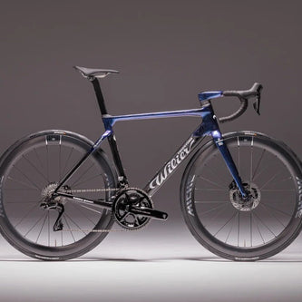 Blue and black Wilier road bike with aerodynamic design and titanium components