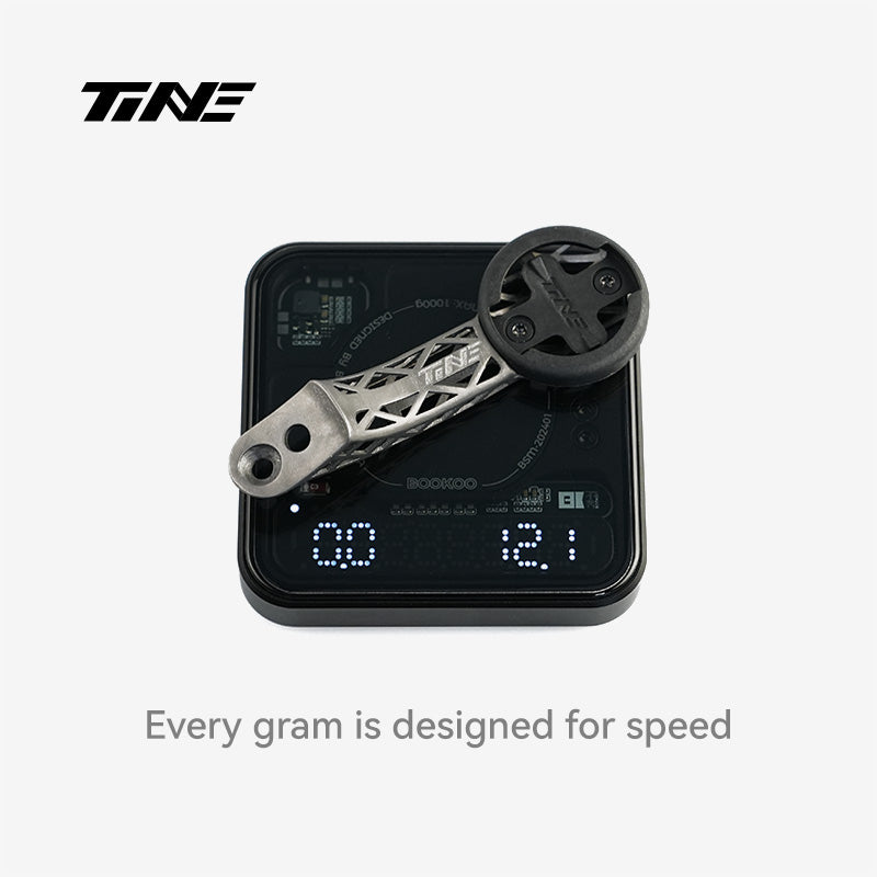 TiNE Colnago CC.01 titanium computer mount on digital scale, lightweight design
