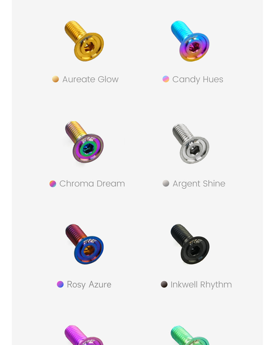 Eight titanium bolts displayed on a white background in pairs, each with a distinct anodized color finish labeled as Aureate Glow, Candy Hues, Chroma Dream, Argent Shine, Rosy Azure, Inkwell Rhythm, and two additional vibrant color variants.