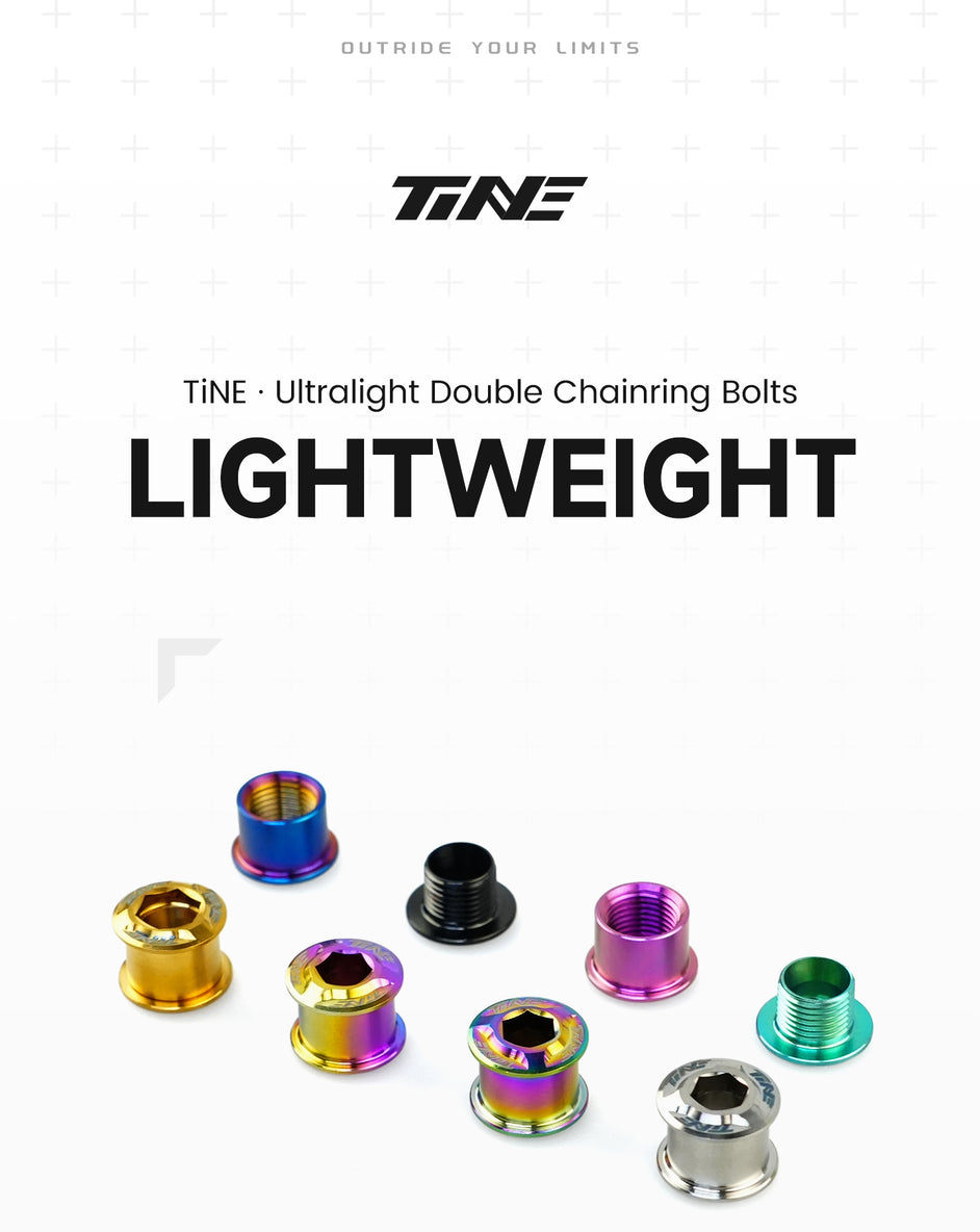 A group of ultralight double chainring bolts in various anodized titanium colors including gold, black, purple, green, and silver, displayed on a white background.
