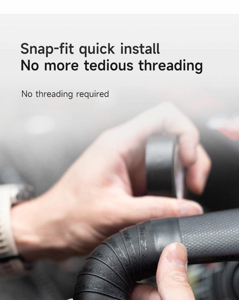 Hands installing black honeycomb handlebar tape with snap-fit quick install, no threading required