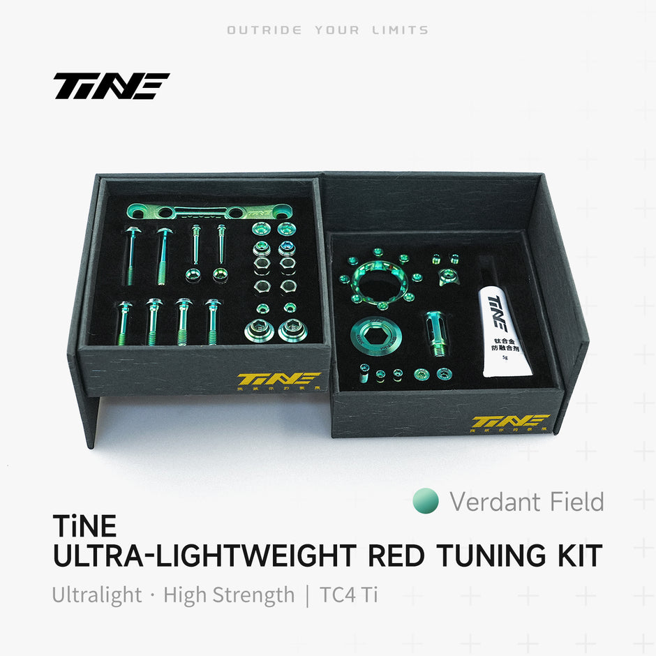 TiNE Tech titanium road bike bolt kit in box with Verdant Field hardware