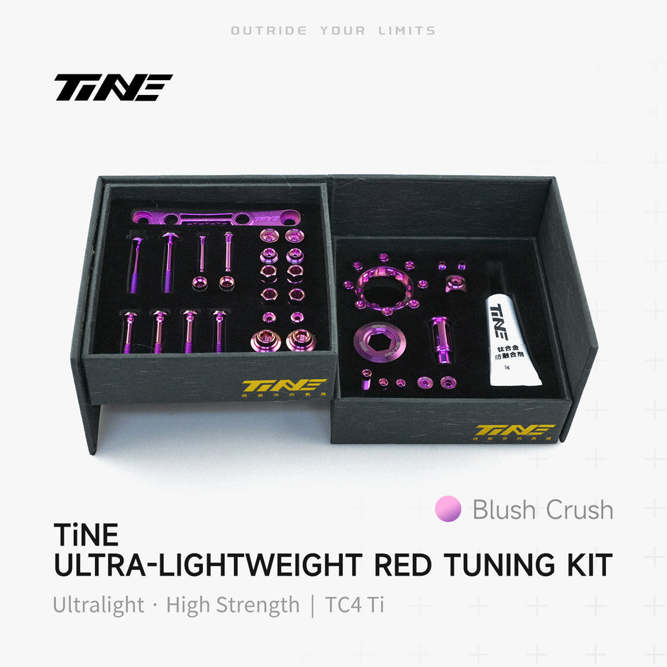 TiNE Tech titanium road bike bolt kit in box with Blush Crush hardware