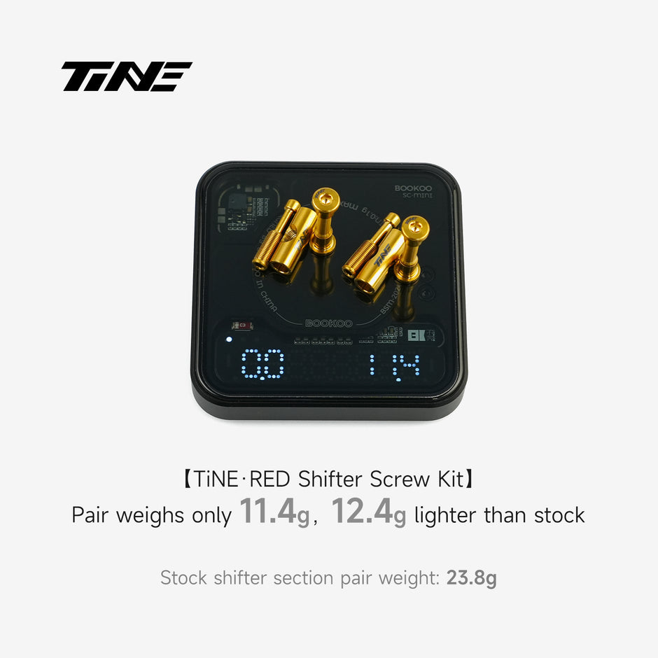 TiNE Titanium Shifter Bolt Kit for SRAM RED - gold bolts on digital scale