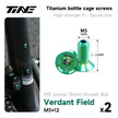TiNE hollow titanium water bottle cage screws, M5×12, verdant field, installed on road bike