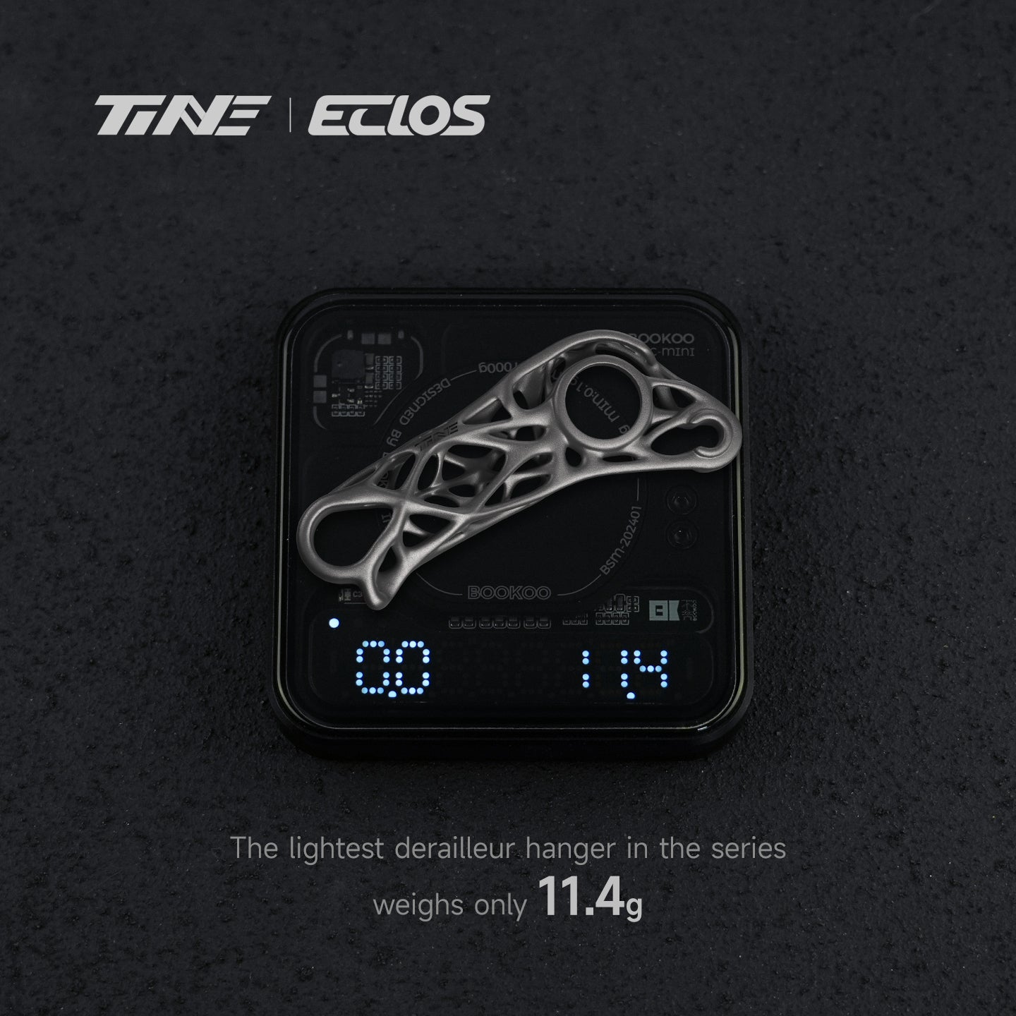 TiNE ECLOS ultra-light titanium derailleur hanger on digital scale