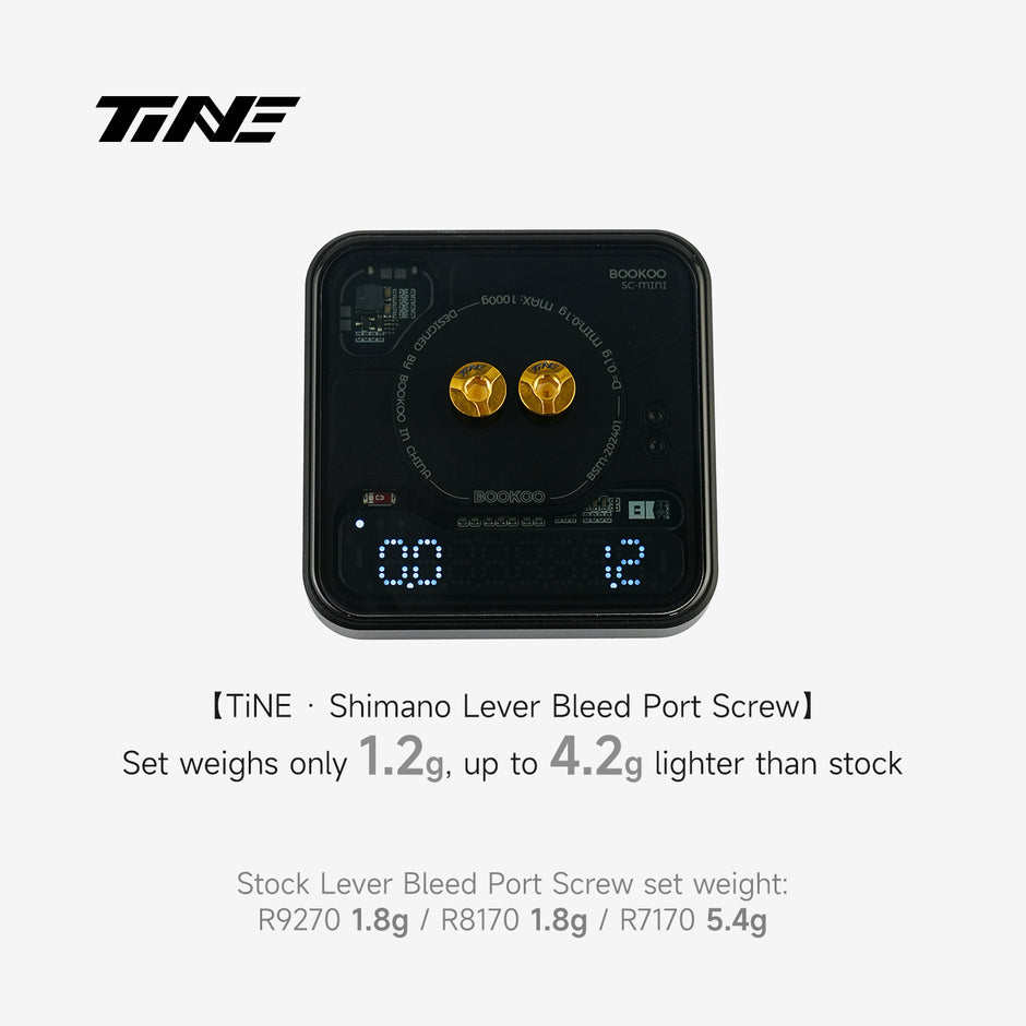 TiNE Tech Shimano ultra-light bleed port screw set on digital scale showing lightweight design