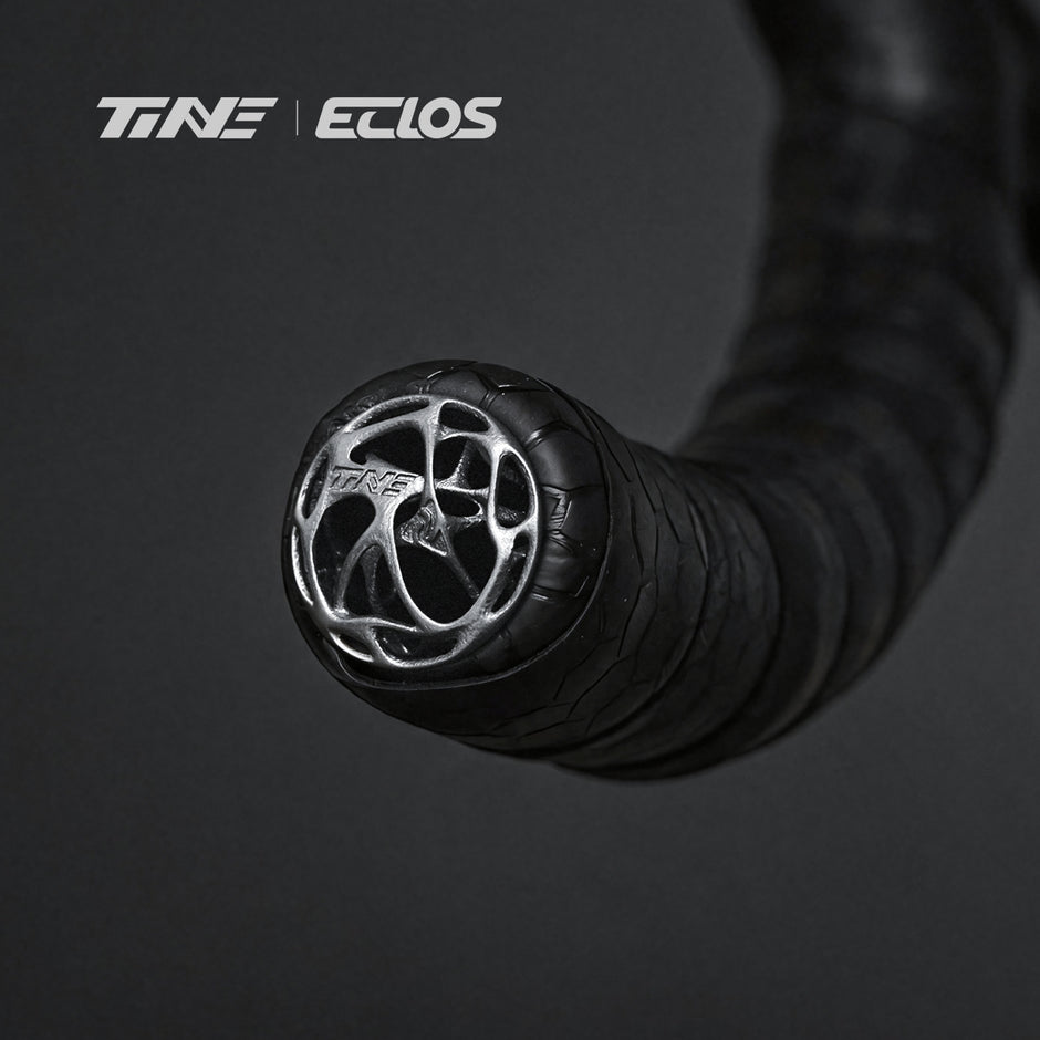 TiNE ECLOS 3g TC4 titanium bar end plug on handlebar with black tape